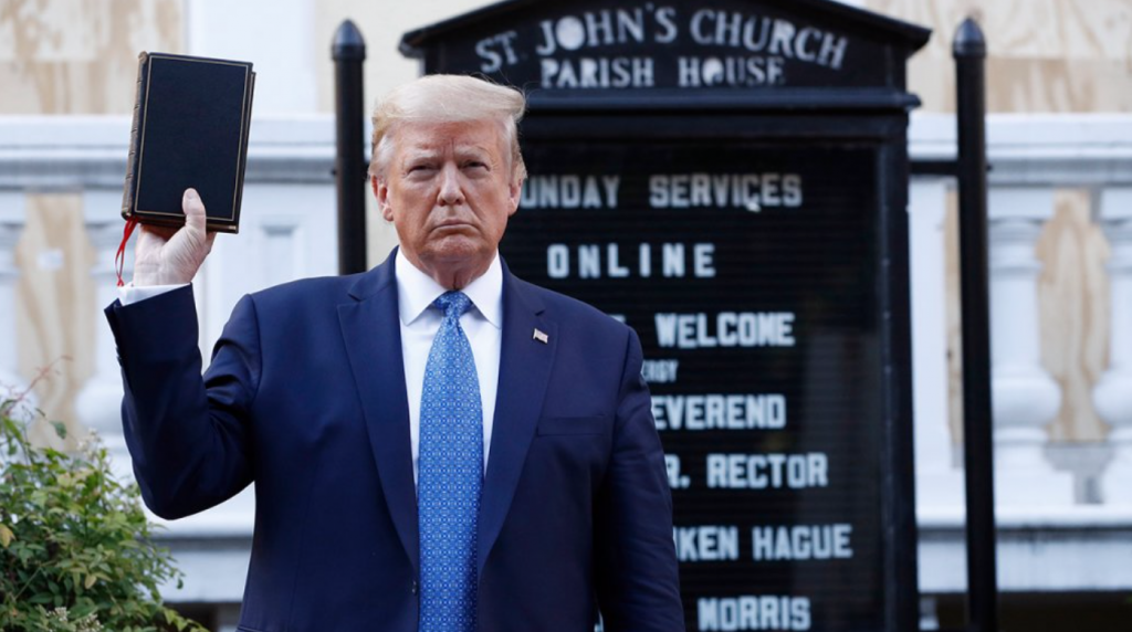 President Donad Trump posing with a Bible after protestors were cleared from the park