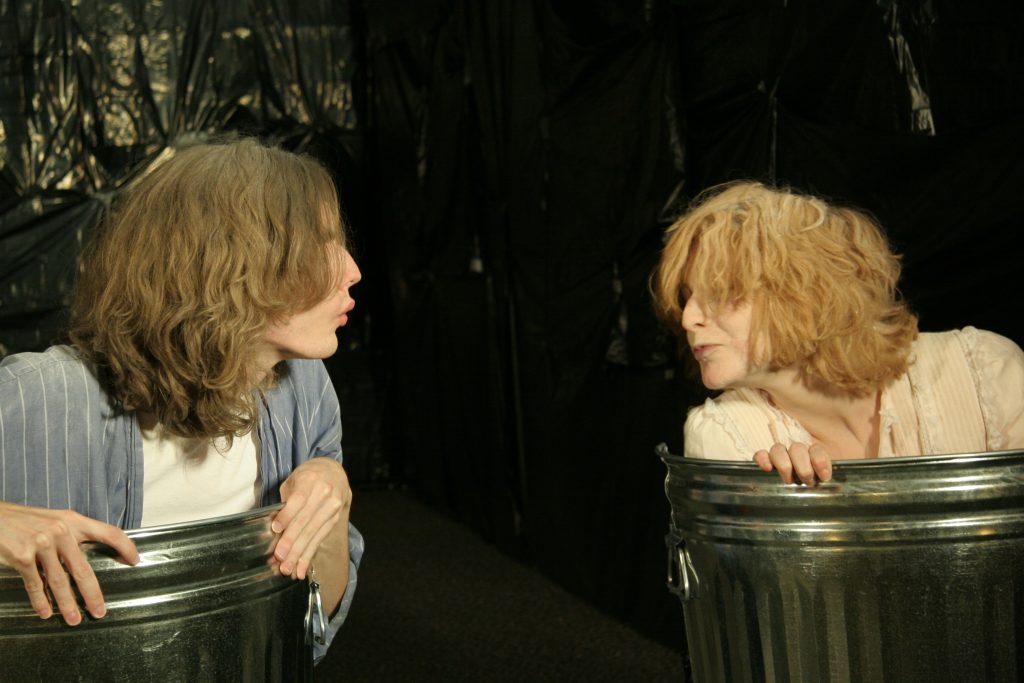 Two actors facing each other onstage in Samuel Beckett's play Endgame.