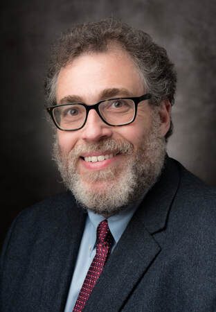 headshot of Dr. Levine