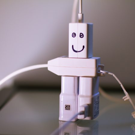 cute robot made of usb chargers
